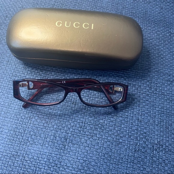 Gucci Red eyeglass frames with horsebit detail